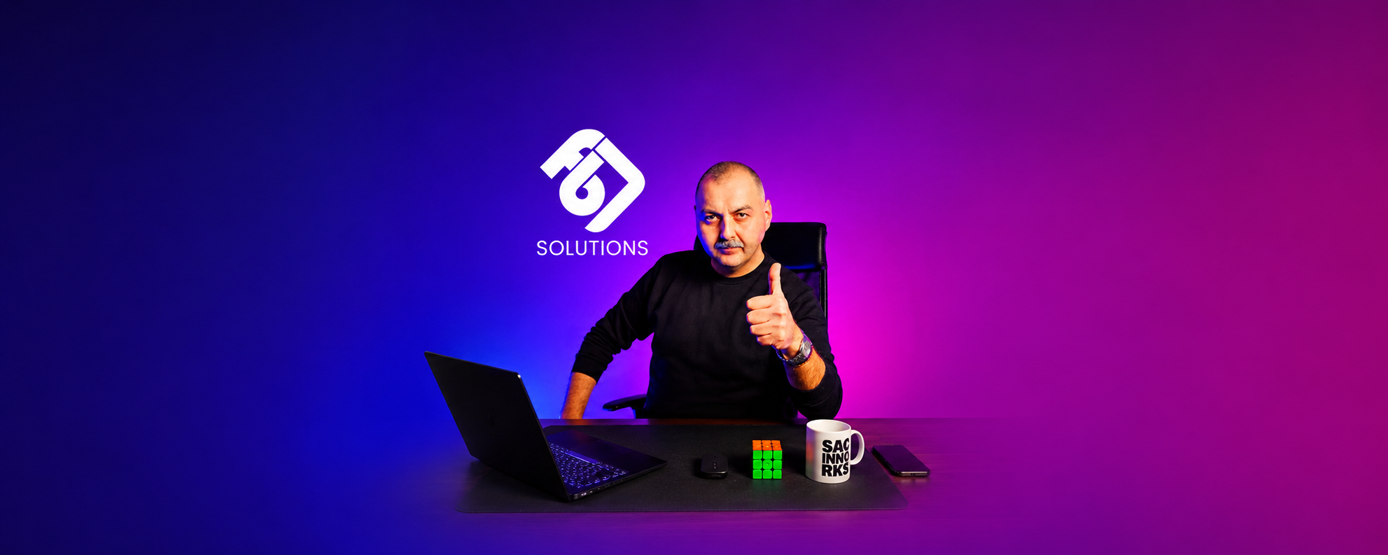 Fatih Bora, founder of FB Software Solutions, at his desk